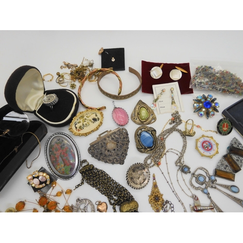 646 - A Swissam ring watch, items by Miracle, vintage glasses and other items