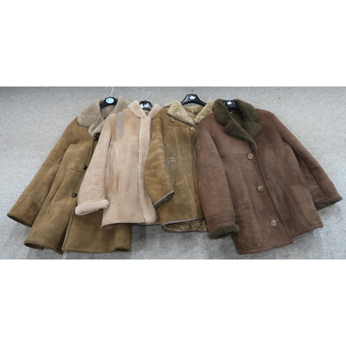 216A - A brown fur jacket and four sheepskin jackets