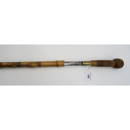 390 - A bamboo sword-stick, the scabbard carved with stylised mushrooms