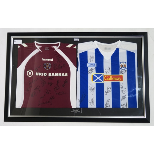 444G - SPORTING MEMORABILIA A framed pair of football shirts, with plaque engraved 