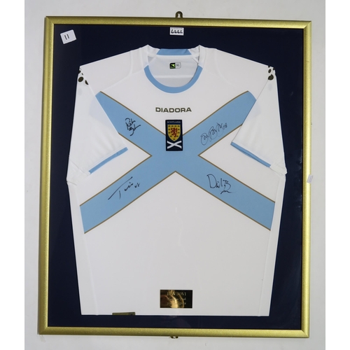 444L - MUSIC/SPORTING MEMORABILIAA framed 2007-08 Scotland away football shirt, signed by the members of Bo... 