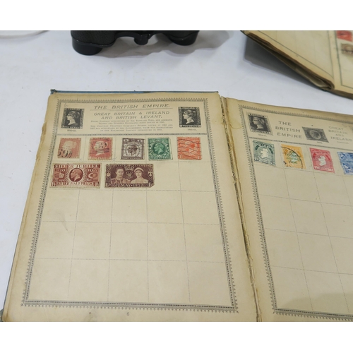 457C - Two small stamp albums containing various British and international stamps, including a Queen Victor... 