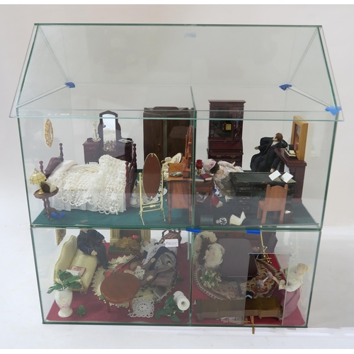 458E - A two-story glass dolls house, approx. 58cm high, containing a quantity of furniture etc., together ... 