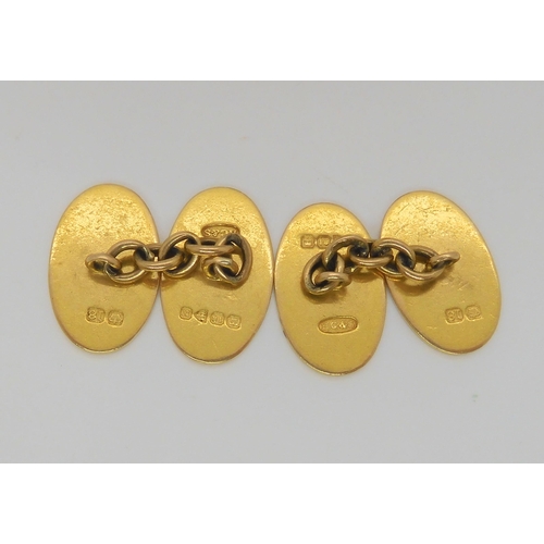 585 - A pair of 18ct gold cufflinks weight 9.7gms, a 9ct bar brooch weight 2.9gms, together with a Ge... 