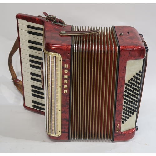 477 - A Hohner 34 key 72 bass piano accordion Arieta IM in red with case