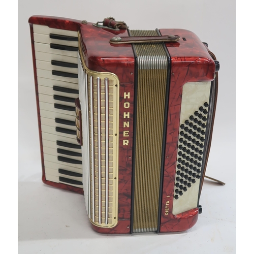 477 - A Hohner 34 key 72 bass piano accordion Arieta IM in red with case