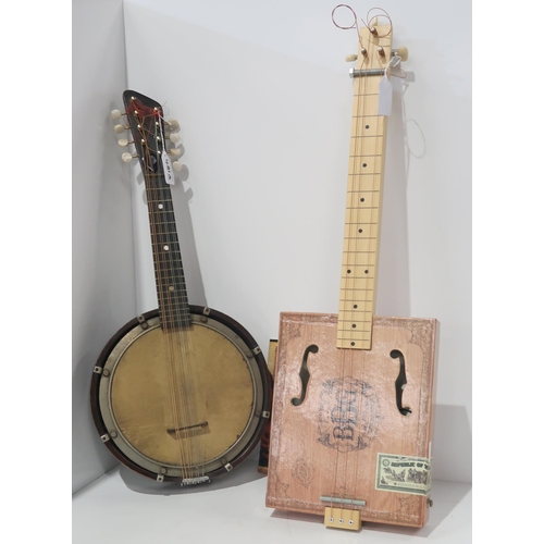 481A - A banjolin and a 3 string cigar box guitar with blues music learning CD