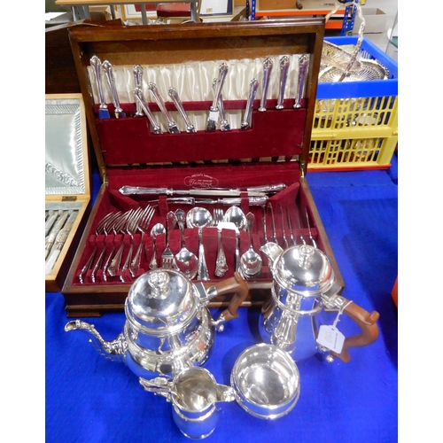 359D - A cased canteen of stainless steel cutlery, and a four piece EPNS tea service with celtic knotwork d... 