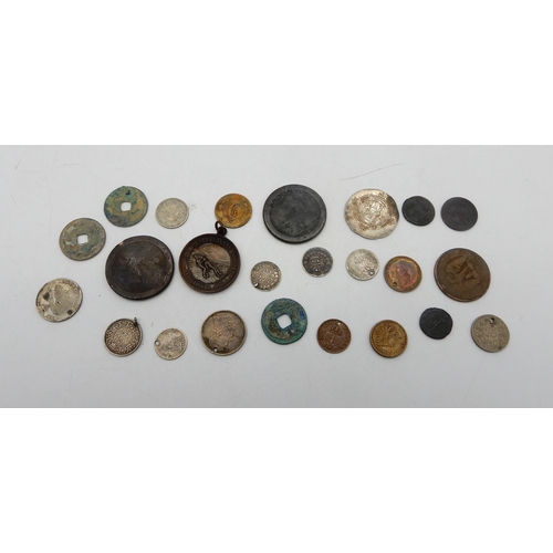 374 - A small collection of coins and tokens