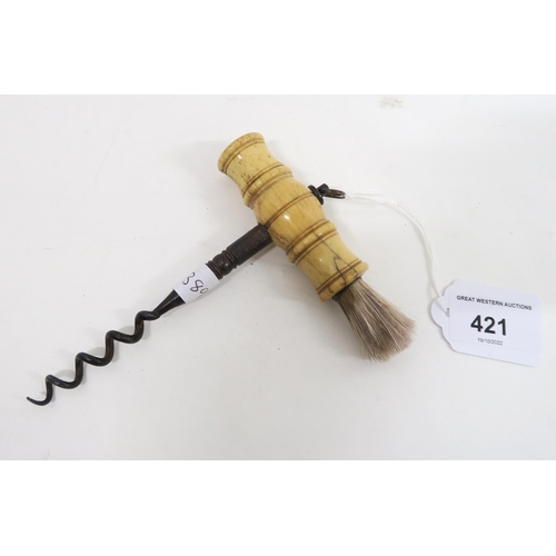 421 - A Victorian bone-handled corksrew, with brush end