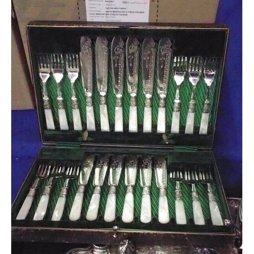 334 - A collection of EPNS mother of pearl handled fish knives and forks, with blades with engraved foliat... 