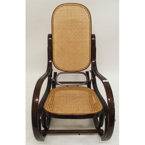 63 - A 20th century bentwood bergere rocking chair, 98cm high x 55cm wide x 96cm deep