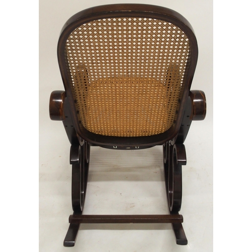 63 - A 20th century bentwood bergere rocking chair, 98cm high x 55cm wide x 96cm deep