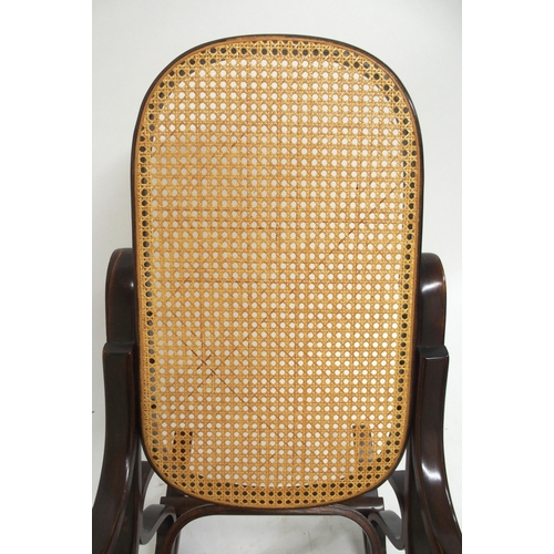 63 - A 20th century bentwood bergere rocking chair, 98cm high x 55cm wide x 96cm deep