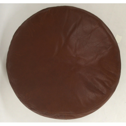 65 - A contemporary leather poof soft footstool