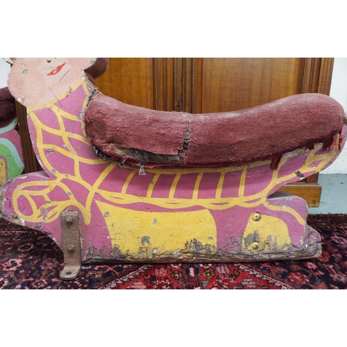 72 - A 20th century fairground merry go round seat painted in the form of a Leprechaun, 99cm high x 104cm... 