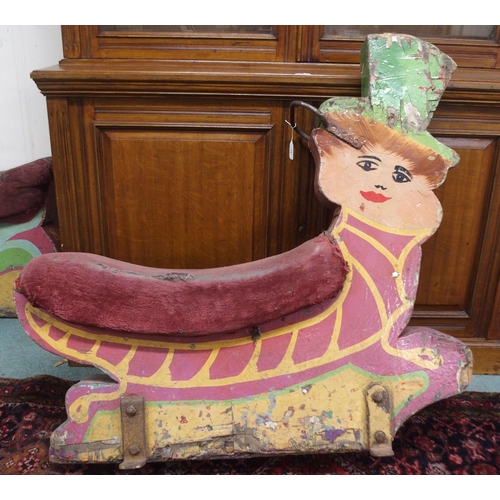 72 - A 20th century fairground merry go round seat painted in the form of a Leprechaun, 99cm high x 104cm... 