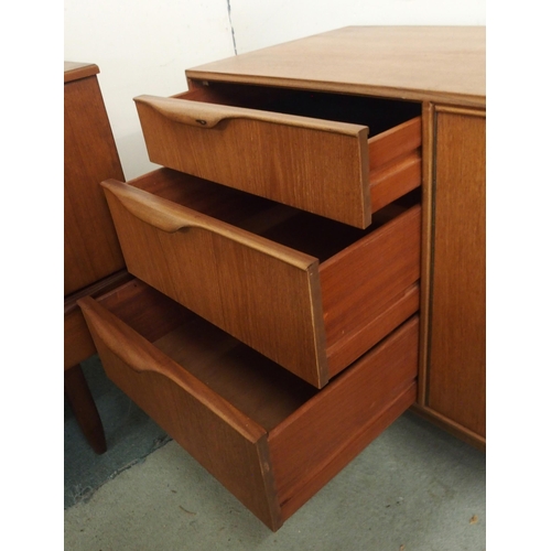 86 - A mid 20th century teak A.H. McIntosh of Kirkcaldy sideboard with pair of cabinet doors by three dra... 