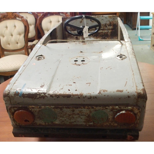 97 - A mid 20th century tin plate child's pedal car, 43cm high x 107cm long x 44cm wide