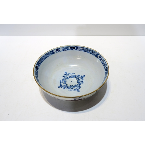 200 - A delft blue and white dish with painted Chinese landscape decoration, 17cm diameter