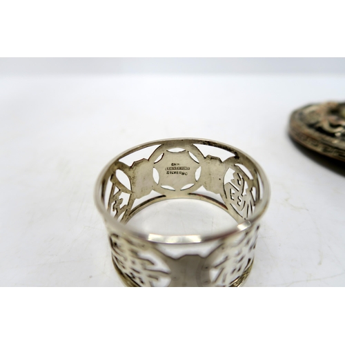 207 - A Lee Yee Hing Chinese silver napkin ring, a pewter tea cannister and a handmirror