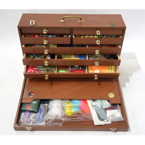 410 - FISHING TACKLEA multi-drawer collector's case, containing an array of fly-tying tools and materials&... 