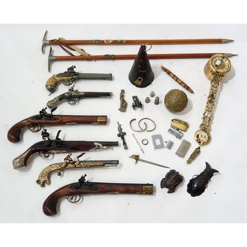 416 - Assorted collectable items, to include various replica flintlock pistols, souvenir mountaineering ax... 