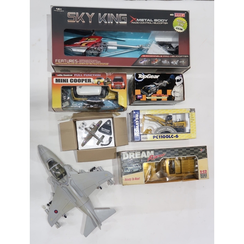 425 - Assorted toy vehicles, mainly boxed, to include a Sky King Metal Body Radio-Control Helicopter, diec... 