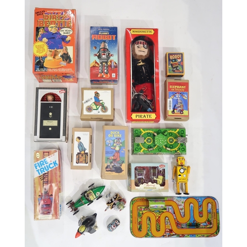 432 - A collection of modern tinplate clockwork toys, many boxed, together with a pirate marionette, Maggi... 