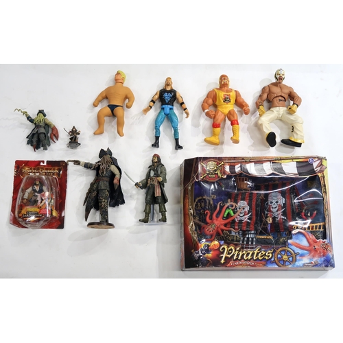 434 - A small collection of Pirates of the Caribbean figures, together with a boxed pirate ship and variou... 