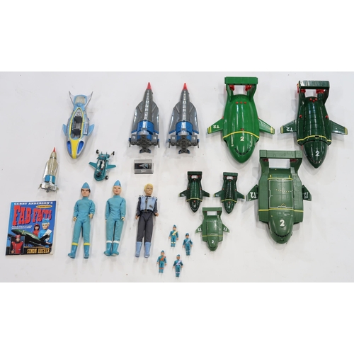 438 - A collection of Thunderbirds action figures and vehicles, to include Thunderbirds 1 and 2 in various... 