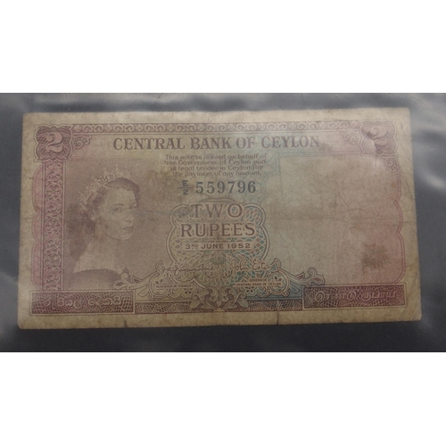 347 - A collection of banknotes with WW2 The Japanese Government One Ruppee and Ten Ruppee, One Centavo  a... 