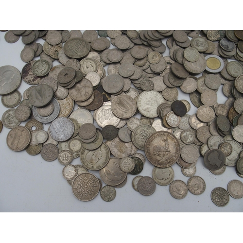 352 - A quantity of British and international coinage Victorian examples