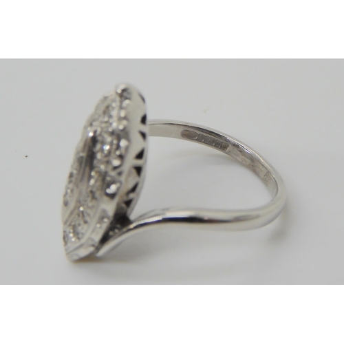 594 - A 9ct white gold diamond set marquis shaped ring, size L, weight 3.8gms