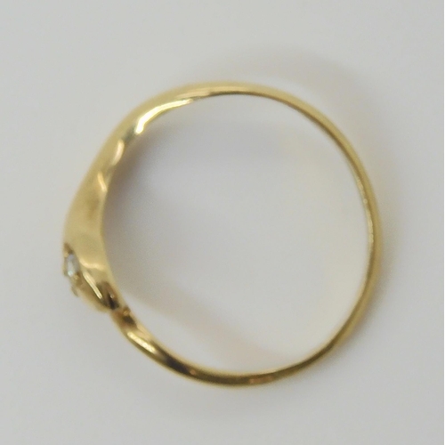 608 - A 9ct gold snake shaped ring with diamond eyes, size N1/2. Weight 1.6gms