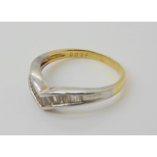 610 - An 18ct gold baguette cut diamond 'V' shaped ring, set with estimated approx 0.35cts, size P, weight... 