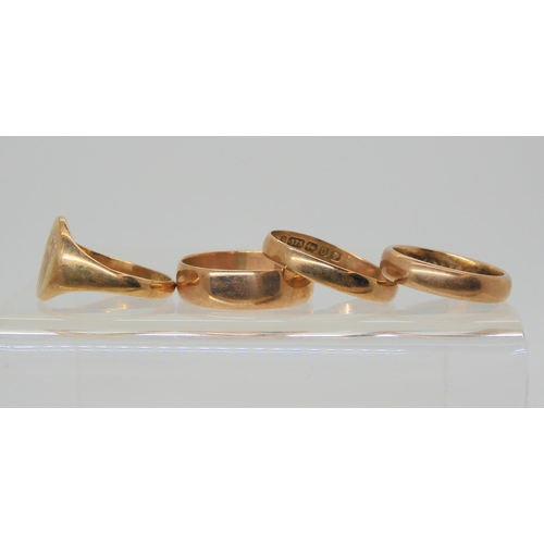 616 - Four 9ct rose gold rings, a signet ring, size Q1/2, and three wedding bands, sizes V1/2, S1/2, and N... 