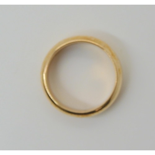 618 - A yellow metal ring, size S, weight 9.7gms