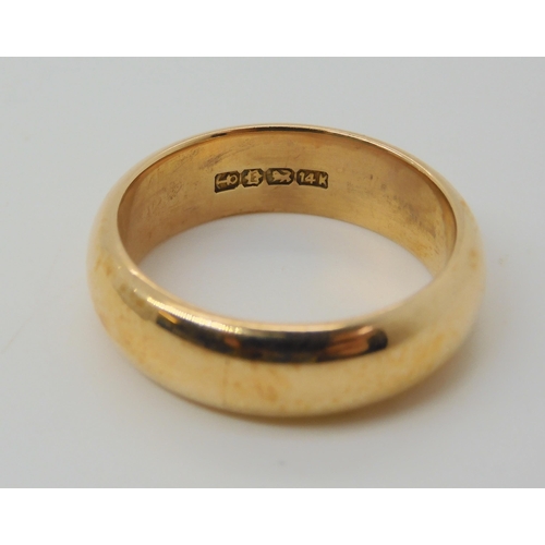 618 - A yellow metal ring, size S, weight 9.7gms