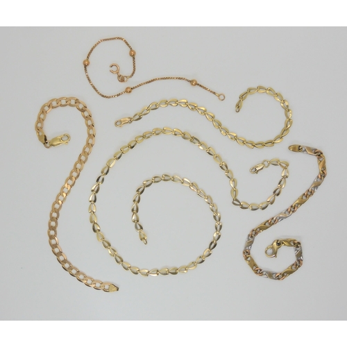 621 - A 9ct gold leaf link necklace and matching bracelet and further 9ct curb and fancy link bracelets, w... 