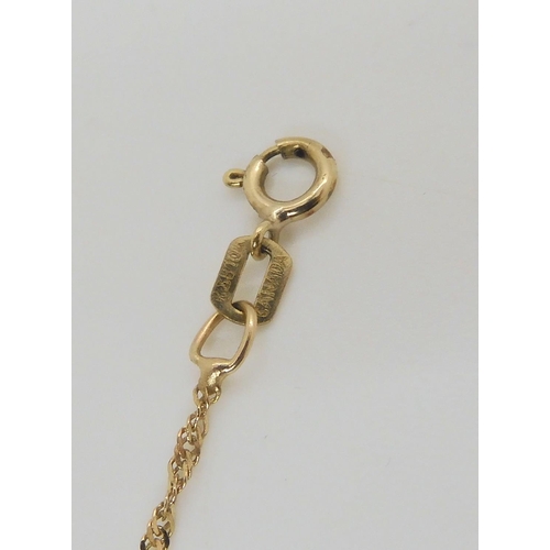 631 - An 18ct gold 0.05ct diamond pendant with a 9ct white gold chain, an 18ct gold stick pin set with a d... 