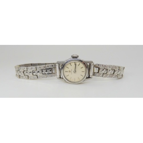 634 - A ladies stainless steel Omega manual wind wristwatch