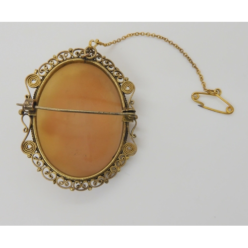 639 - A well carved cameo in a gilded white metal brooch mount