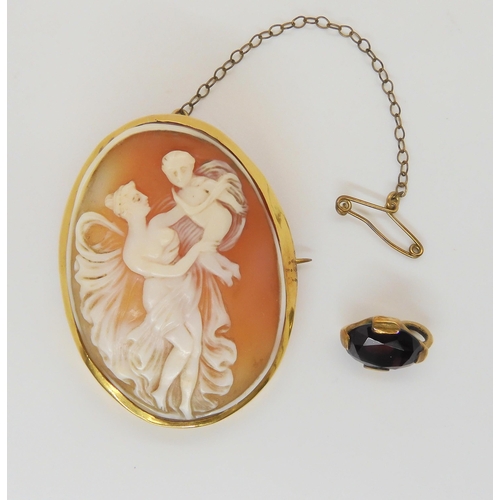 640 - A yellow metal mounted cameo, together with a yellow metal mounted garnet pendant, weight together 1... 