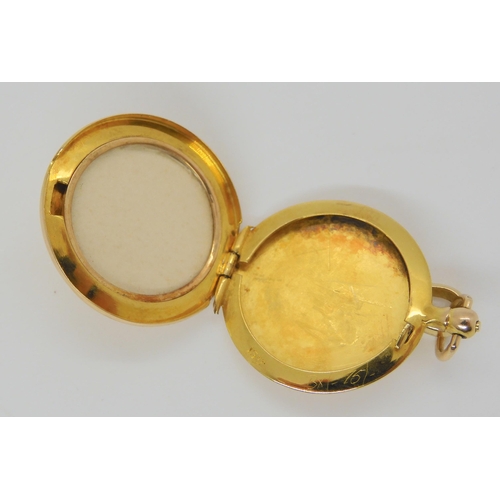 647 - A 15ct gold plain locket weight 6.8gms