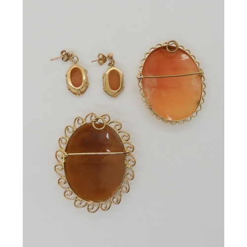 653 - Two 9ct gold cameo pendant brooches with a pair of matching earrings, weight together 15.8gms