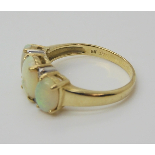 666 - A 9ct gold opal and diamond ring, size O1/2, together with a 9ct gold signet ring size P, weight tog... 