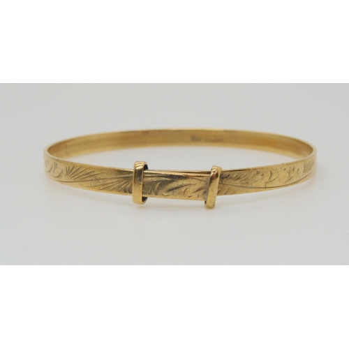 670 - A 9ct gold child's Christening bangle, max inner diameter 5.5cm, weight 6.7gms 