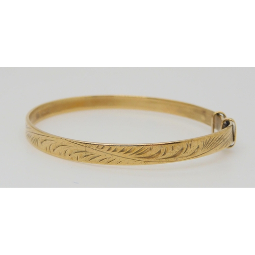 670 - A 9ct gold child's Christening bangle, max inner diameter 5.5cm, weight 6.7gms 