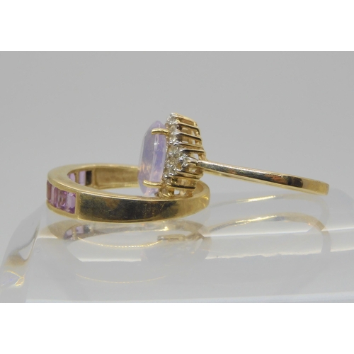 680 - A 9ct gold purple sapphire band ring, size P1/2, together with a (ct yellow gold lavender quartz and... 